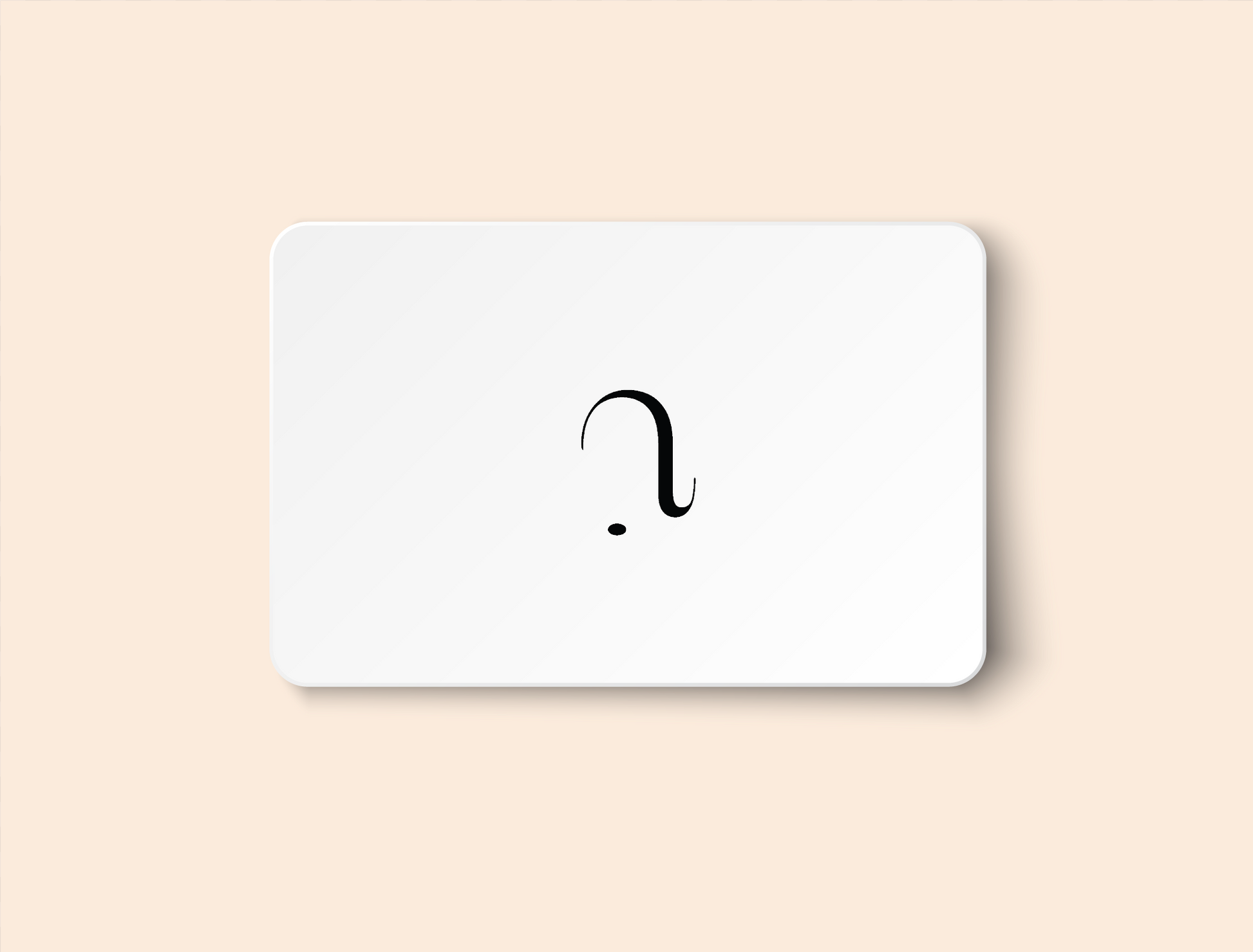 White gift card with the Nuria Atelier logo (upside down version of the Arabic character for the letter "N").